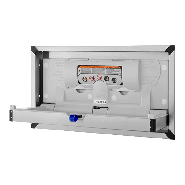 A recessed horizontal stainless steel baby changing station with a fold-down table.