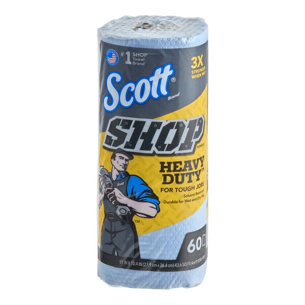 A roll of blue Scott Shop heavy duty towels with illustrated packaging showing a worker holding a wrench.