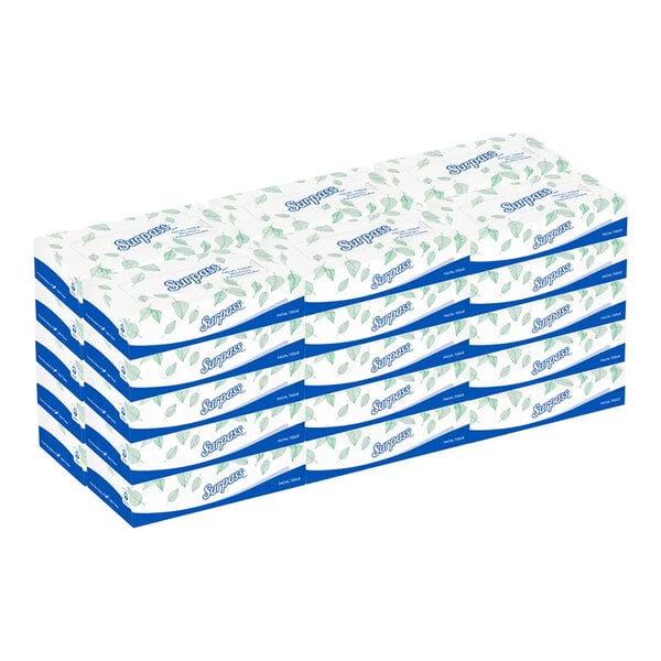 A stack of rectangular tissue boxes with a white and green leaf pattern and blue accents, arranged in three rows of ten boxes each.