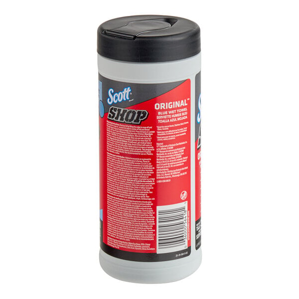 A cylindrical container with a black lid and a red label, displaying text and a barcode.