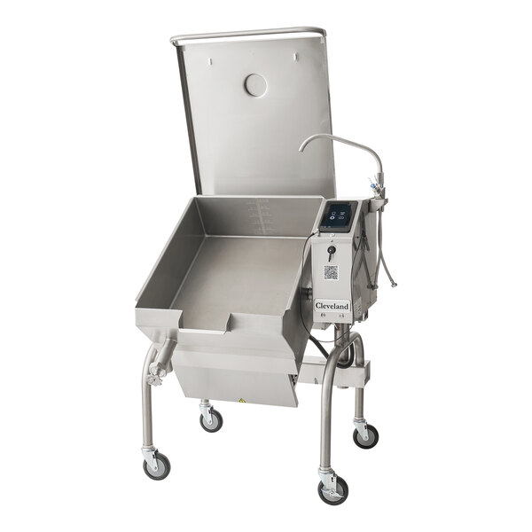 A large stainless steel commercial tilt skillet with an open base, digital controls, and a raised lid, mounted on four caster wheels.