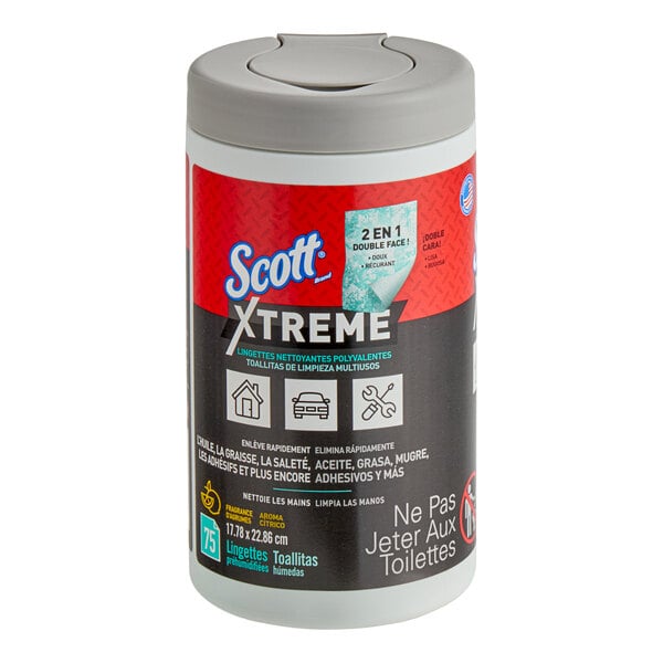 A cylindrical container with a gray lid labeled 'Scott Xtreme' containing multi-purpose cleaning wipes, featuring bilingual text and icons indicating various cleaning uses.
