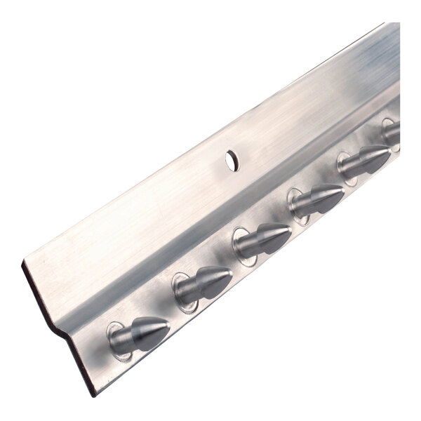 A metal mounting bracket with protruding pegs, used for attaching strip door kits.