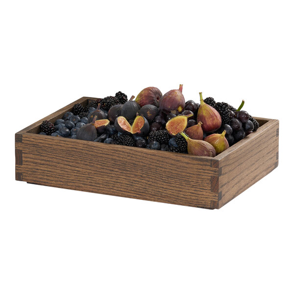 A rectangular medium oak wood tray filled with assorted dark fruits.