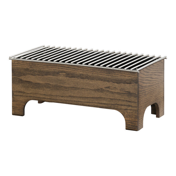 A rectangular wooden chafer with a metal grate top.