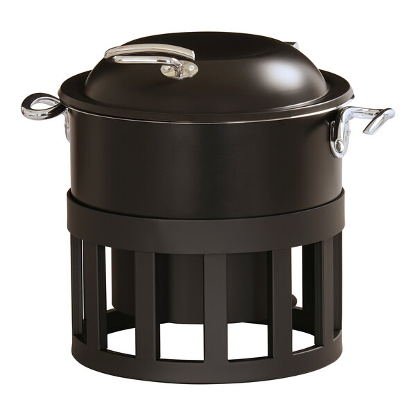 A round black chafing dish with a lid and metal handles, set on a matching open-frame stand.