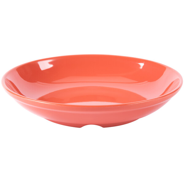A close up of a GET Diamond Rio Orange melamine bowl with a bright orange color on a white background.