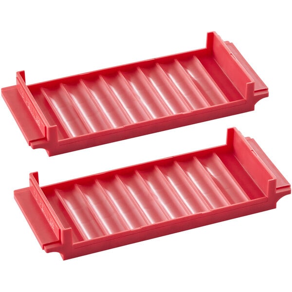 A set of two red plastic coin trays designed for organizing pennies.