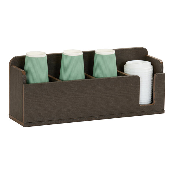 A four-compartment mocha-colored cup and lid organizer made of HDPE, holding green cups and white lids.