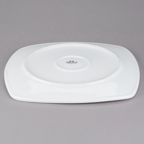 a white plate with a logo on it