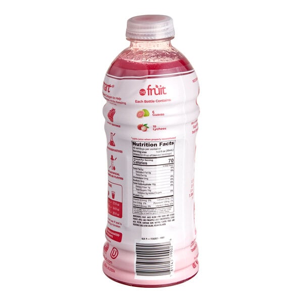 A plastic bottle of Smartfruit Guava Lychee Breeze 100% fruit puree beverage mix.