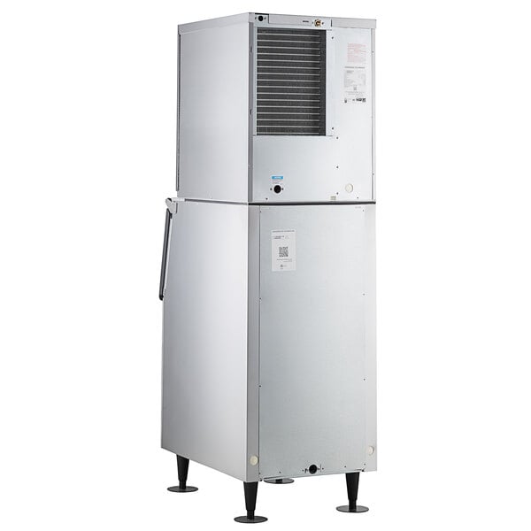 A commercial air-cooled modular crescent ice machine with a stainless steel finish and an attached ice storage bin.