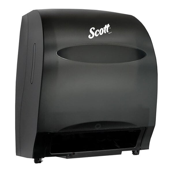 A black wall-mounted automatic paper towel dispenser with a translucent front panel and the brand name 'Scott' visible at the top.