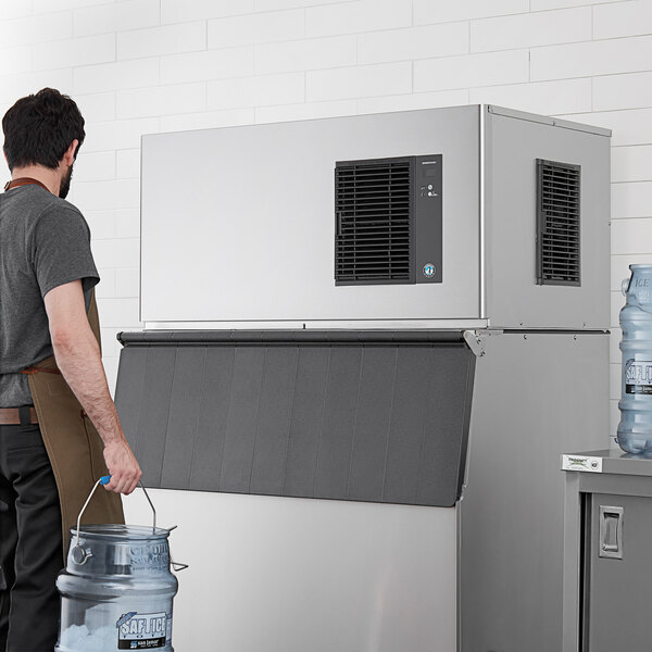 A commercial Hoshizaki air-cooled stackable square cube ice machine with a stainless steel exterior.