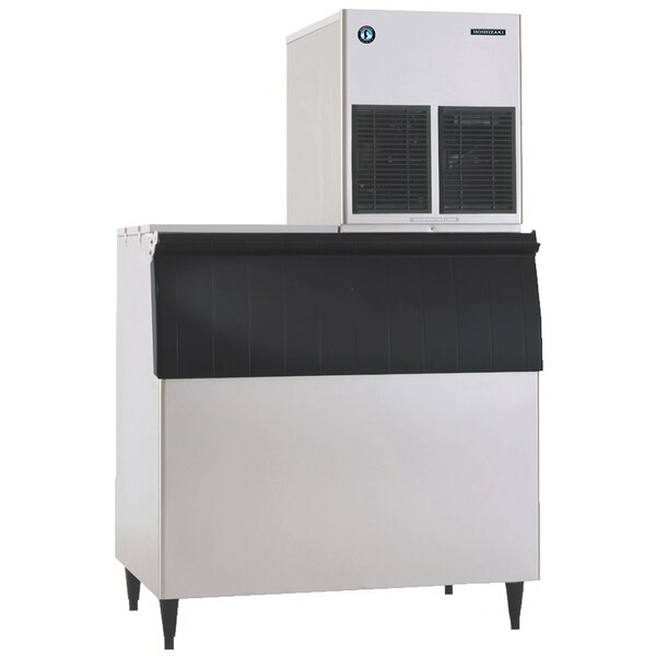 A commercial air-cooled modular flake ice machine with a stainless steel exterior and a black front panel.