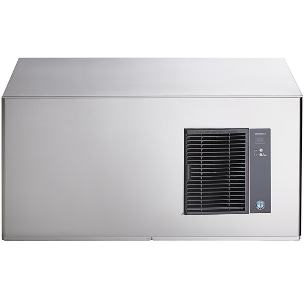 A stainless steel air-cooled stackable square cube ice machine with an integrated ice storage bin.