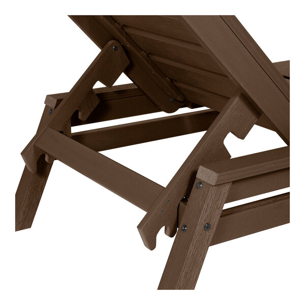 A close-up view of a brown adjustable poly-lumber chaise lounge chair.