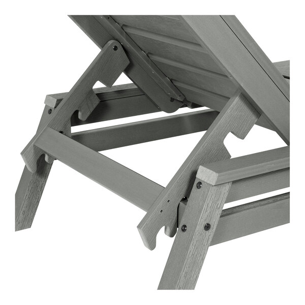 A close-up view of a gray adjustable poly-lumber chaise lounge chair.