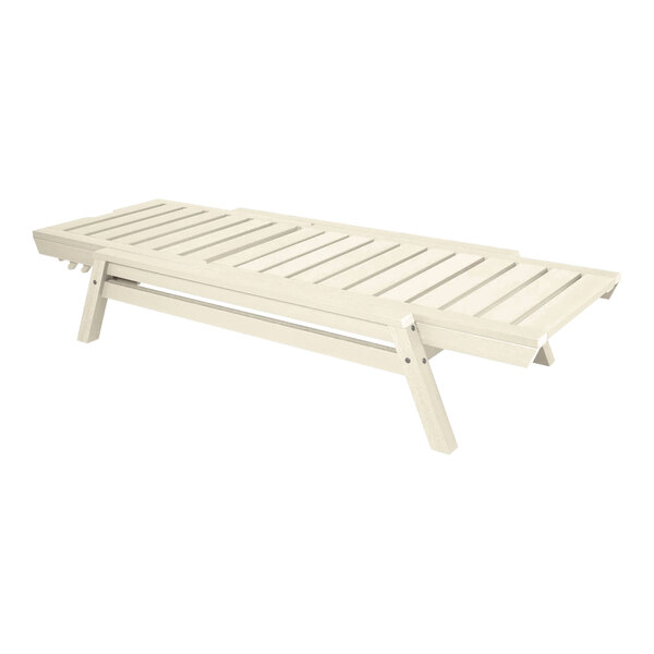 A white adjustable and stackable poly-lumber chaise lounge with a slatted design.