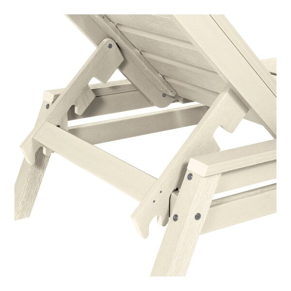 A close-up view of a white adjustable stackable poly-lumber chaise lounge.