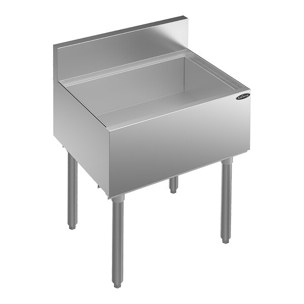 A stainless steel underbar ice bin with four legs and a backsplash.
