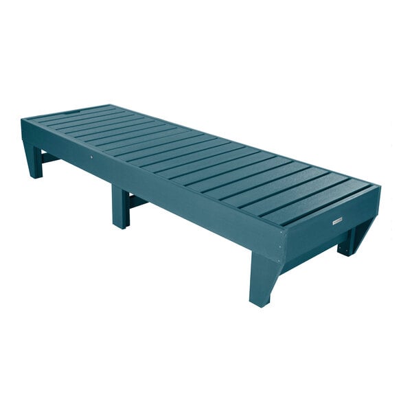 A blue adjustable stackable poly-lumber chaise lounge with a slatted design.