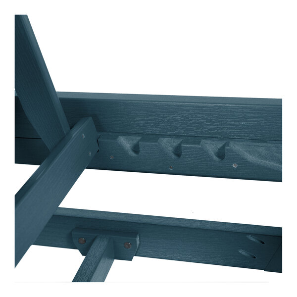 A close-up view of the blue poly-lumber frame of an adjustable stackable chaise lounge.