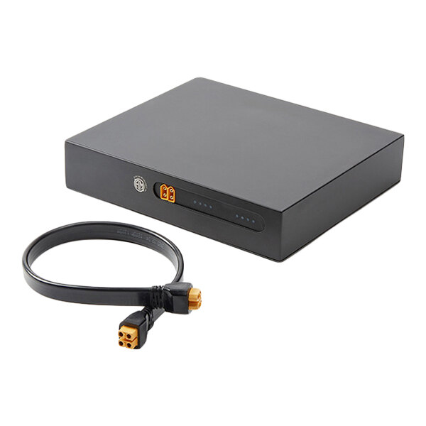 A rectangular black power pack with indicator lights and a connecting cable, designed for buffet equipment.