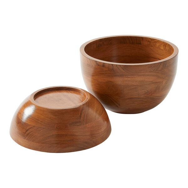 A set of two round acacia wood hourglass bowls, one upright and one upside down.