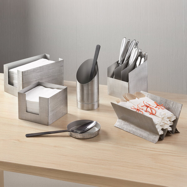 A stainless steel three-section flatware holder with an etched finish, designed for organizing utensils.