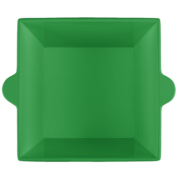 A green square bowl with handles.