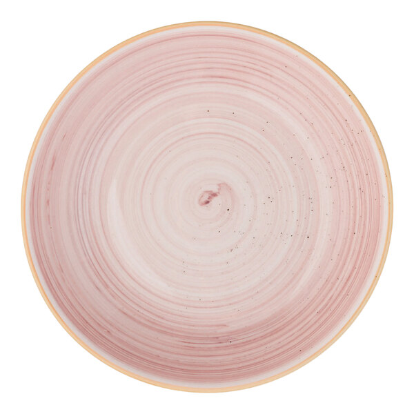 A round pink deep coupe plate with a subtle swirl pattern.