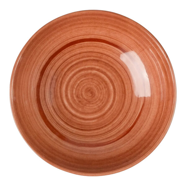 A round orange melamine coupe bowl with a concentric circle pattern.