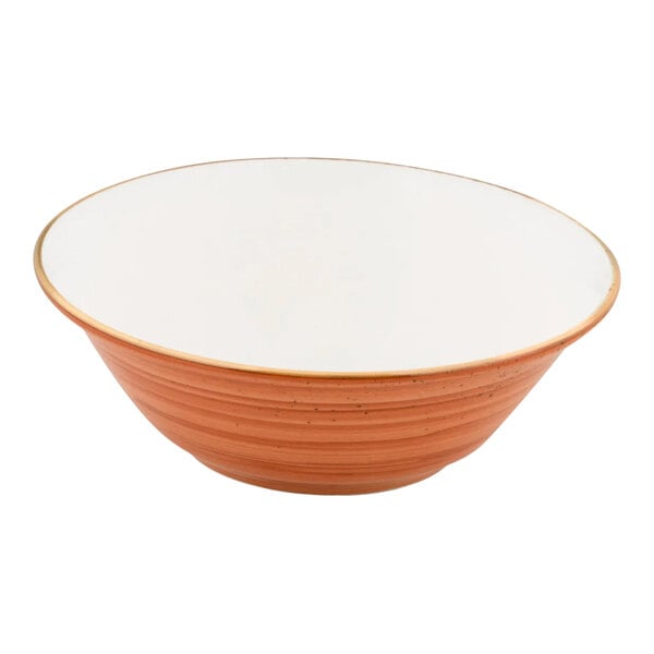 A round orange porcelain bowl with a white interior.