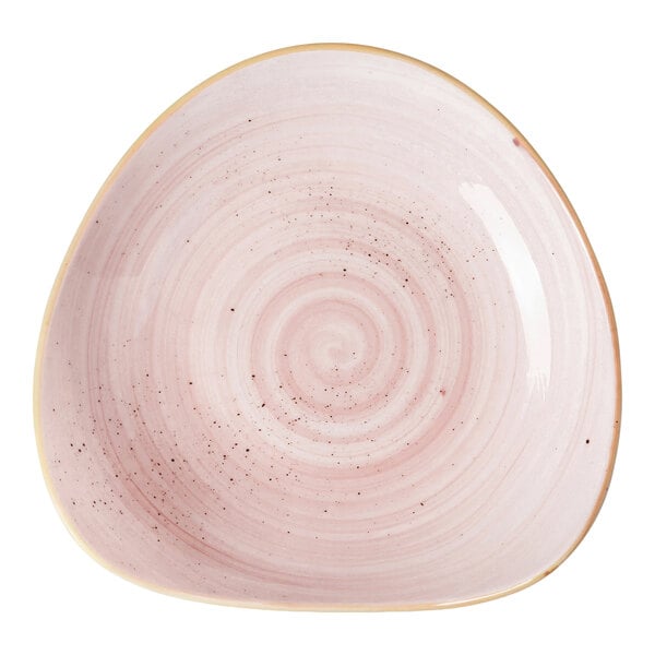 A triangular pink porcelain bowl with a swirl pattern.