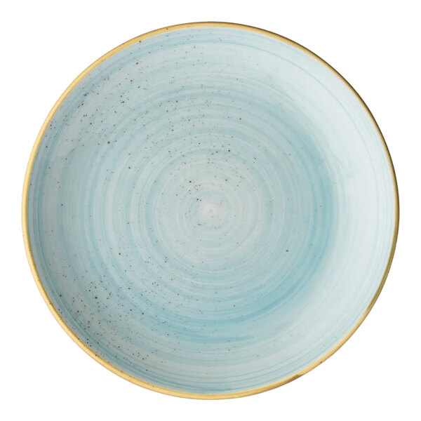 A round light blue porcelain coupe plate with a subtle speckled pattern and a slightly raised rim.