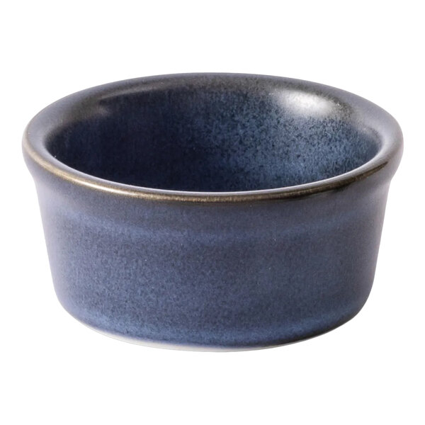 A small round matte blue porcelain ramekin.