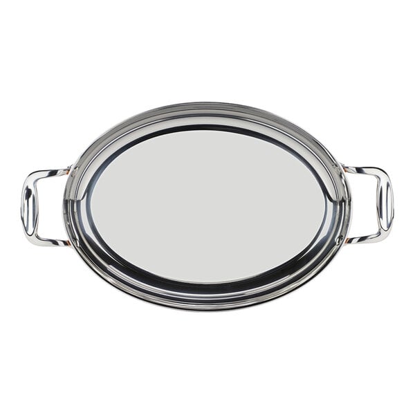 An oval stainless steel roasting pan with handles on each side.