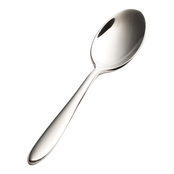 A stainless steel demitasse spoon with a polished finish and a simple, modern design.