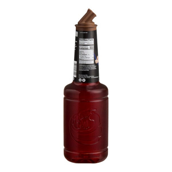 A 1-liter bottle of Finest Call Demerara Simple Syrup with a brown pour spout.