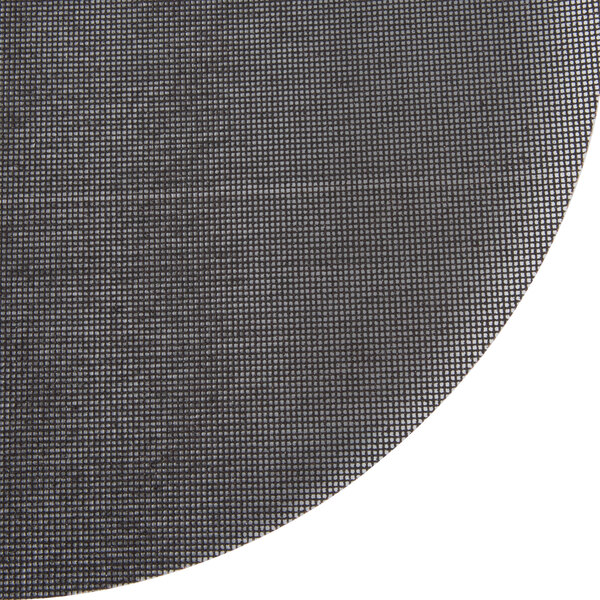 A close-up of a black mesh sanding disc with a white background.