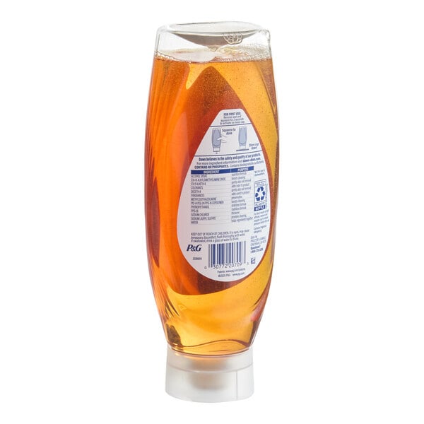 A clear plastic bottle of orange-scented Dawn Ultra EZ-Squeeze dish soap with a white cap.