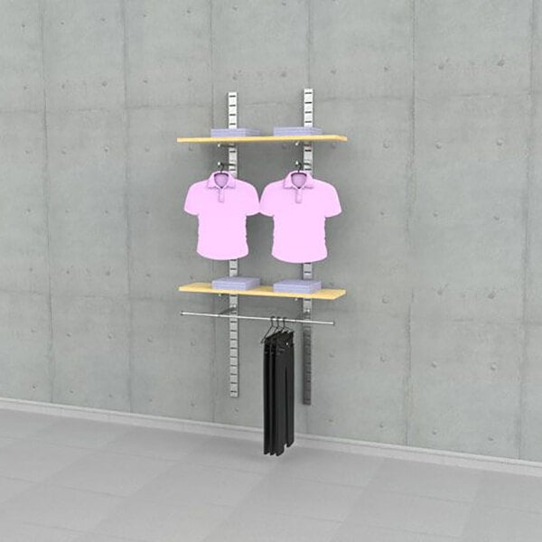 A vertical wall-mounted retail clothing display with two wooden shelves, two hanging rails, and two faceouts for displaying shirts and pants.