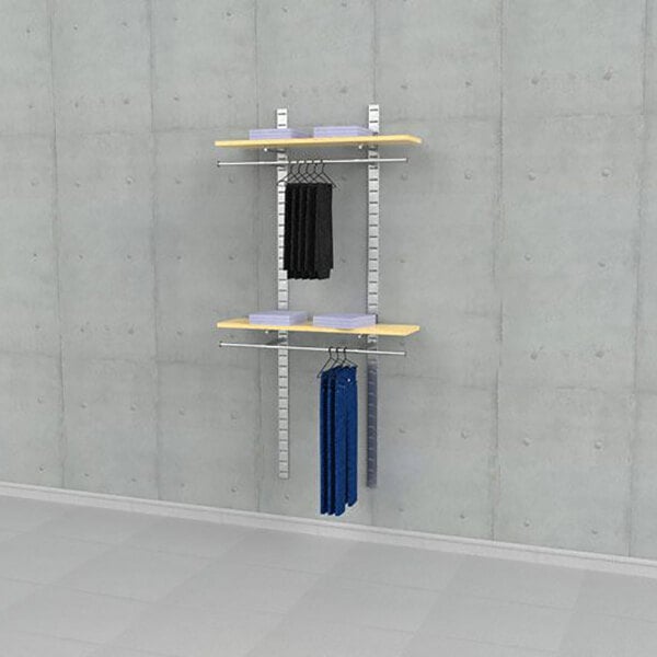 A vertical wall-mounted retail clothing display with two wooden shelves and two hanging rails for garments.