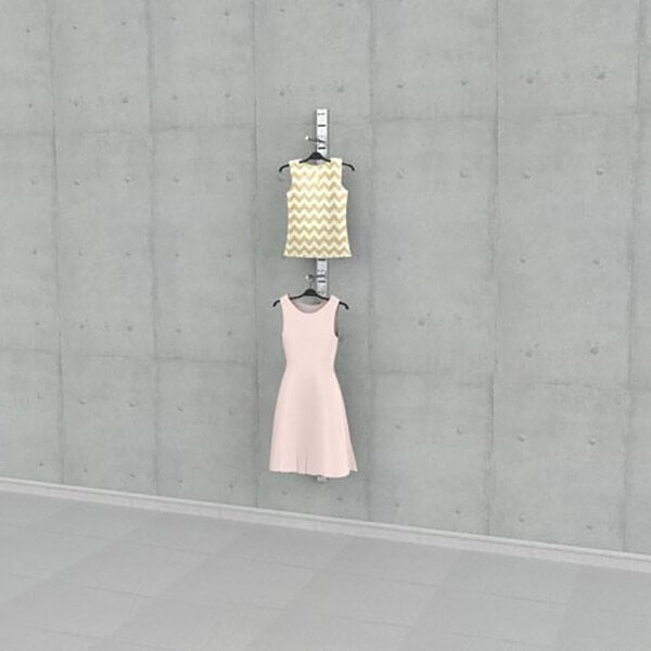 A vertical wall-mounted retail clothing display with two faceouts holding a sleeveless dress and a sleeveless top.