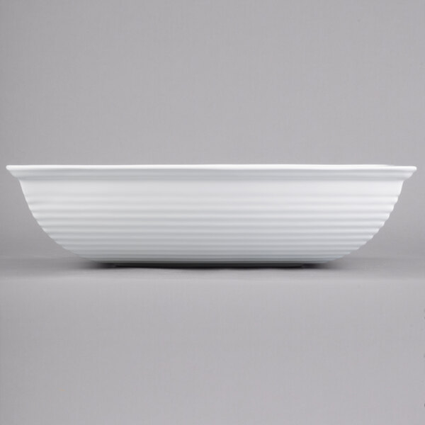 A white rectangular Tablecraft salad bowl.