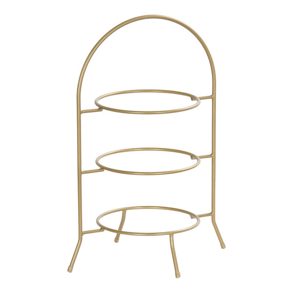 A matte gold three-tier plate stand with circular holders and an arched frame.