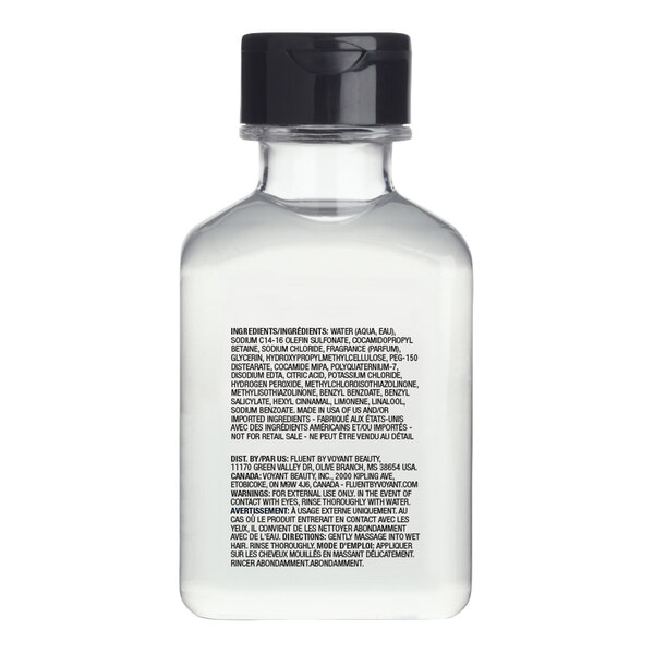 A small clear plastic bottle with a black cap containing Grey + Finch Crisp Air Shampoo.