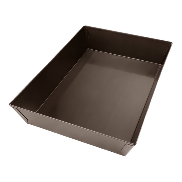 A rectangular glazed carbon steel Detroit style pizza pan with high sides.