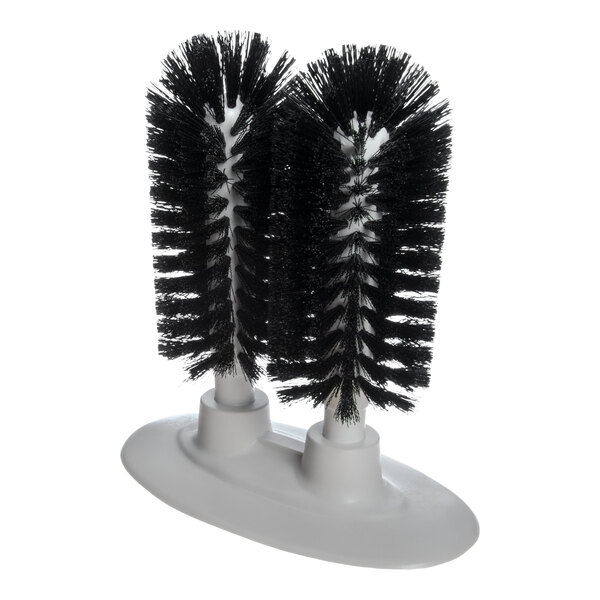 A manual twin glass washer with two black bristle brushes mounted on a white base.